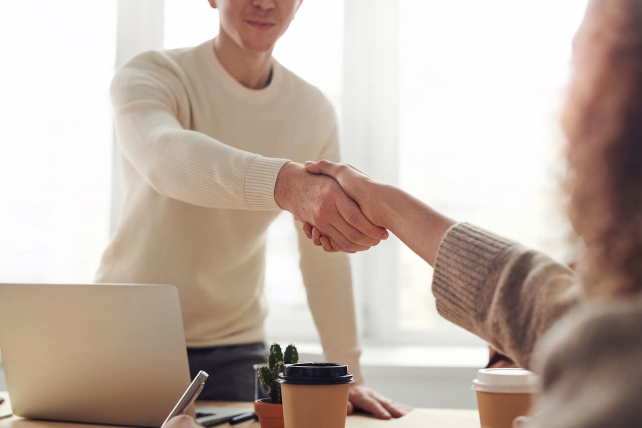 a cinergie representative makes a deal with a local regina business owner