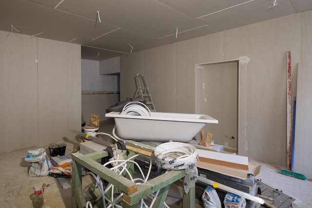 a pile of construction debris sits in the unfinished basement of a rental home