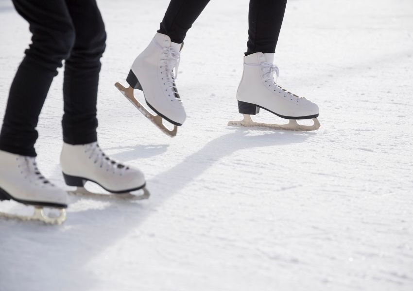 two-pairs-of-skates-on-ice