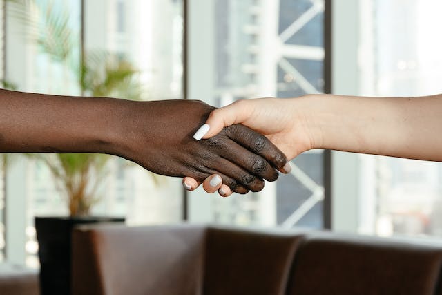 two people shaking hands
