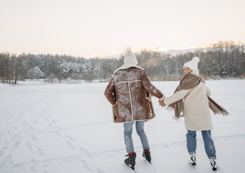 two-people-skating-on-snow